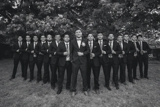 a group of men standing next to each other