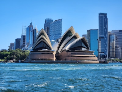 a large building in the middle of a body of water