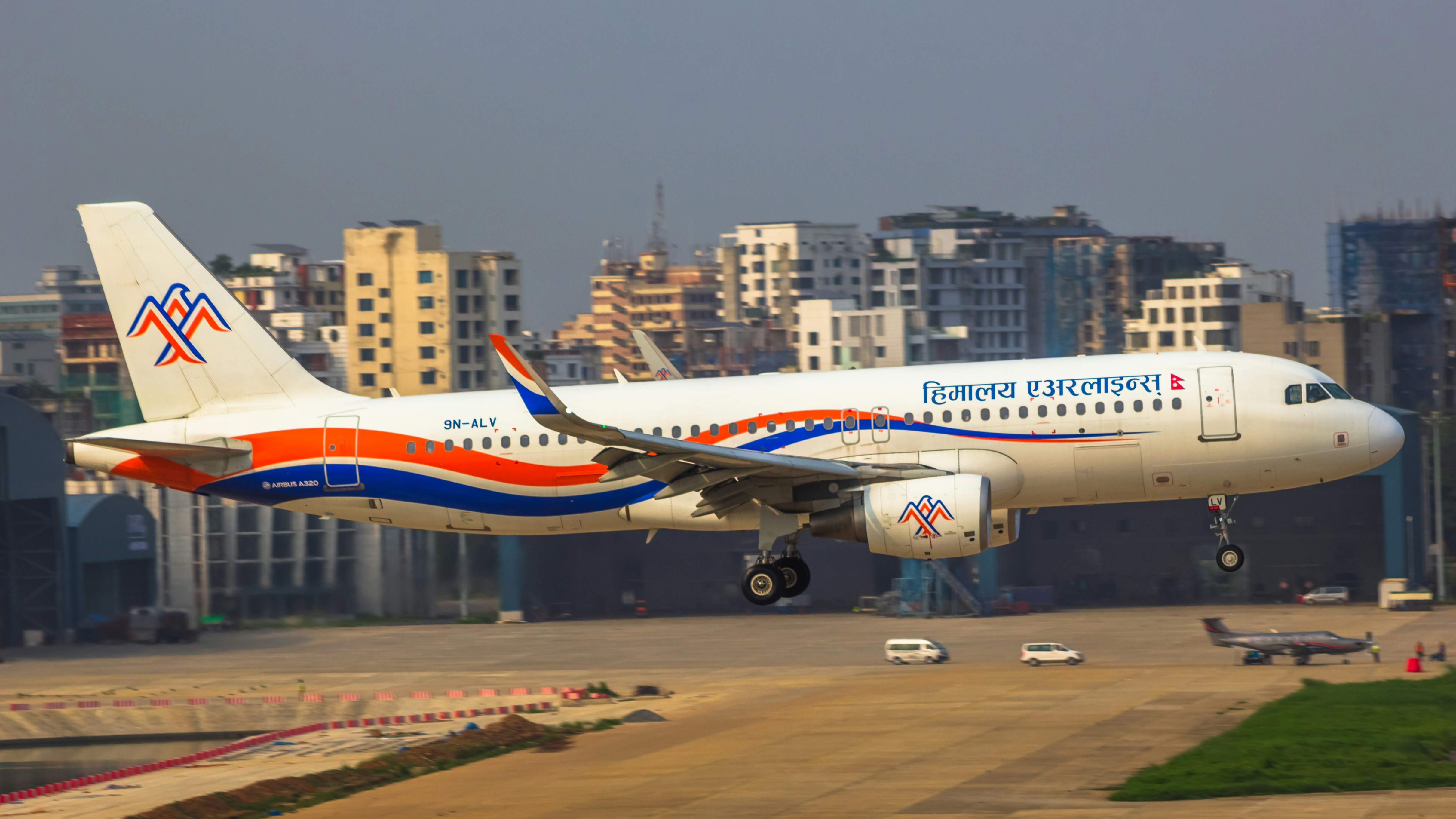 a large passenger jet taking off from an airport, 
