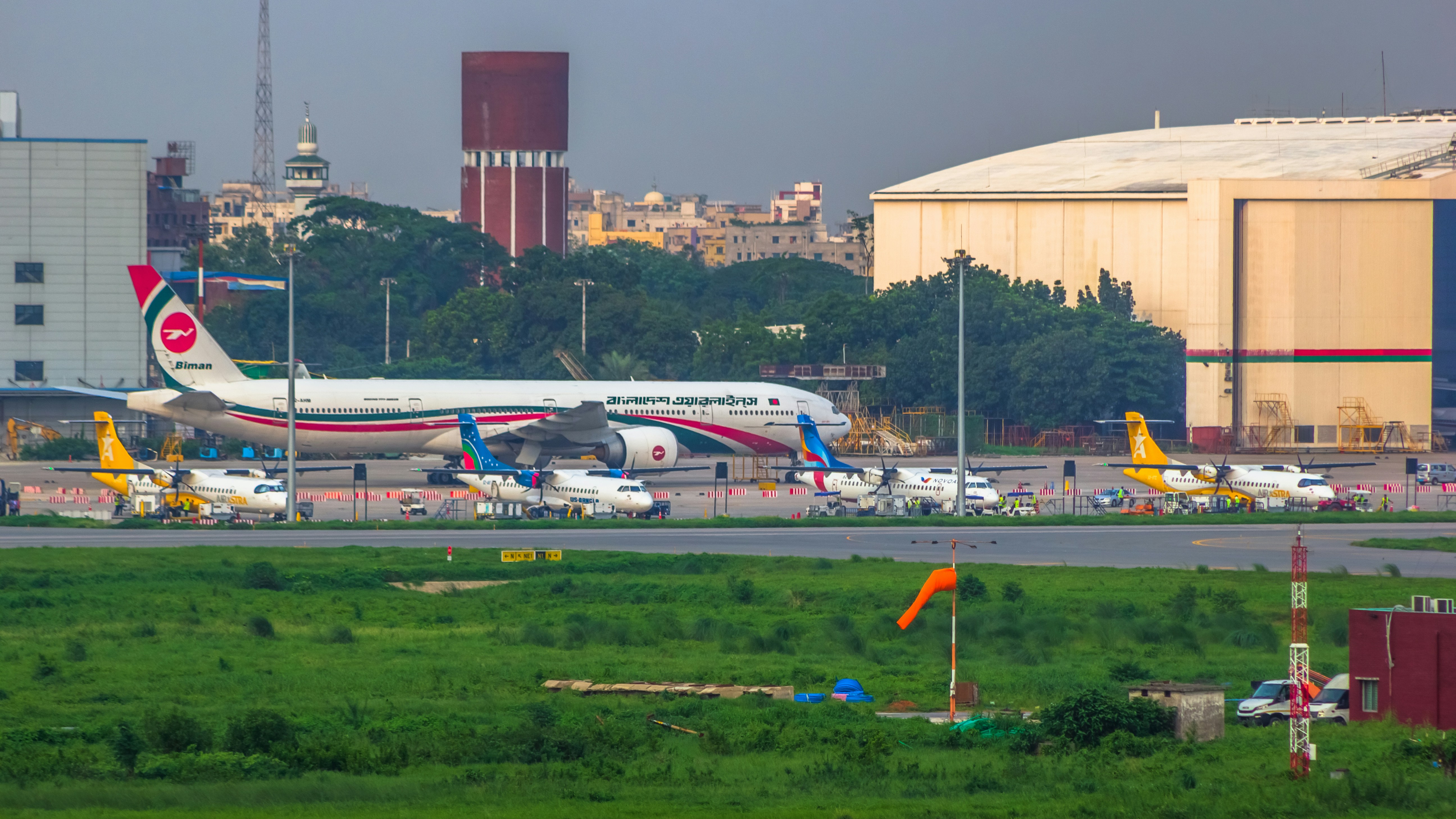 a large jetliner sitting on top of an airport runway, ATR