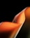 a black background with an orange and yellow wave