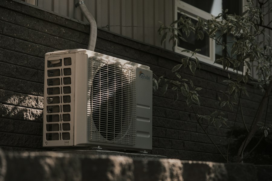 Outdoor heat pump unit beside a house