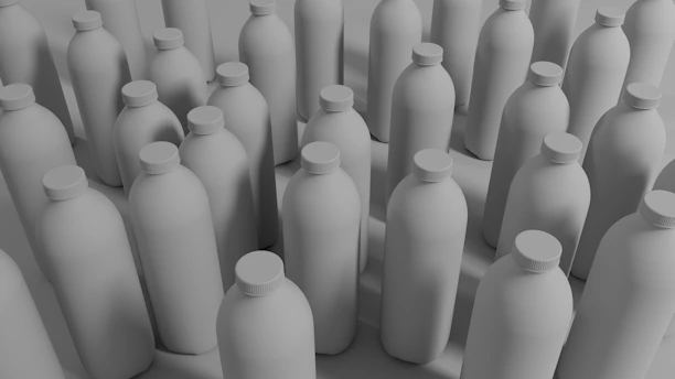 a lot of bottles that are standing in the middle of a room