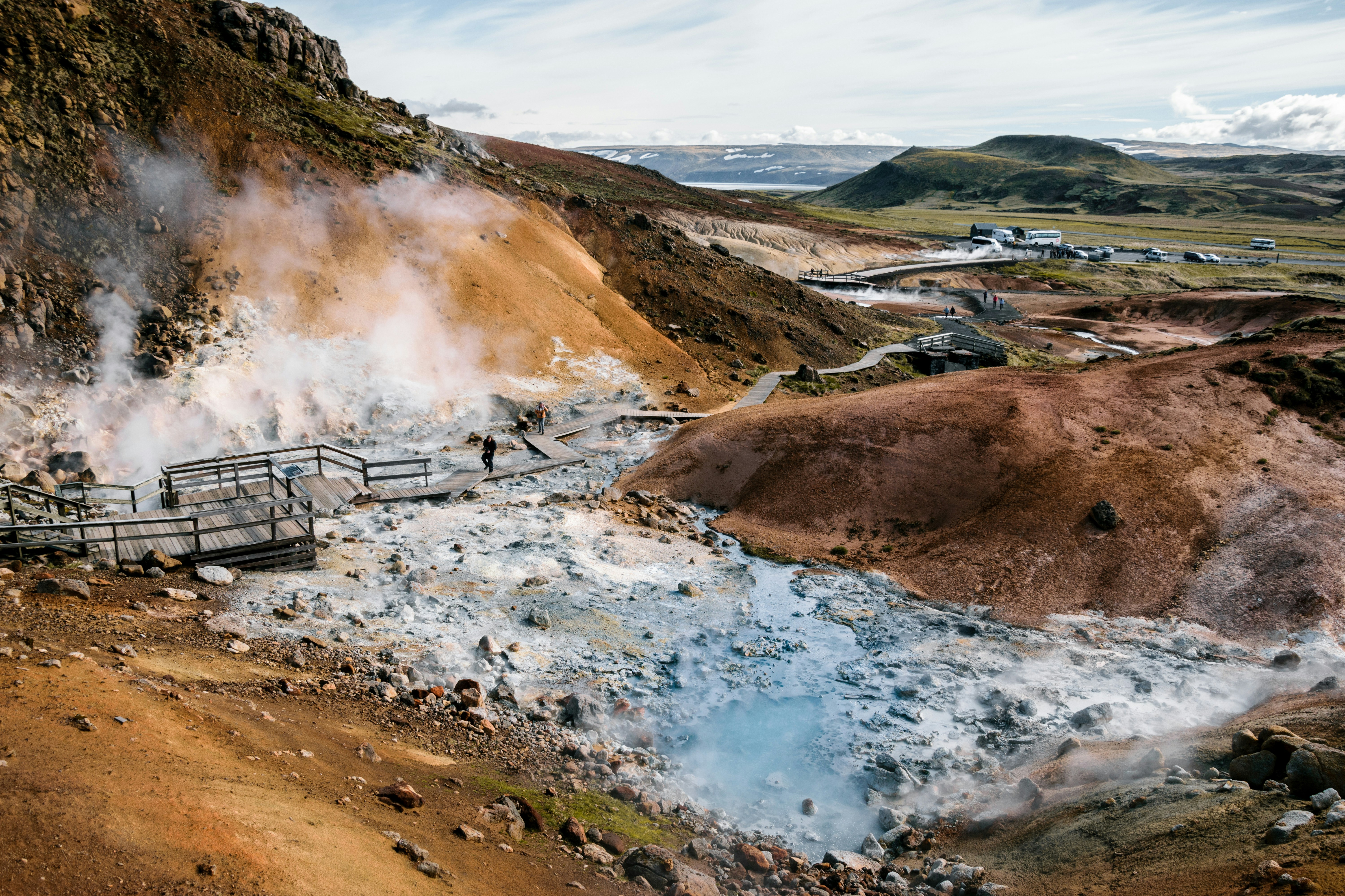 a hot spring in the middle of a mountain