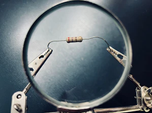 a close up of a magnifying glass on a table