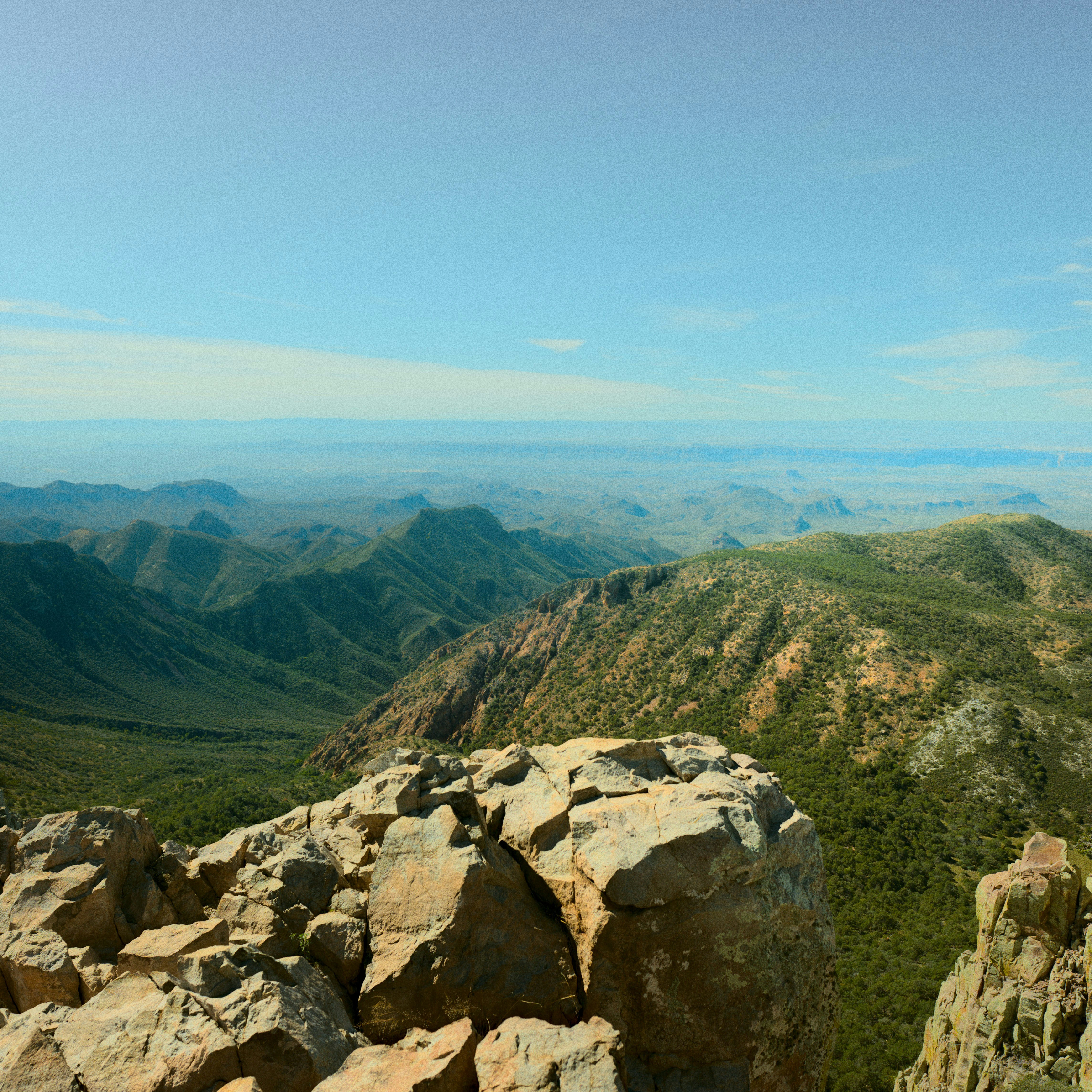 a view of a mountain range from a high point of view