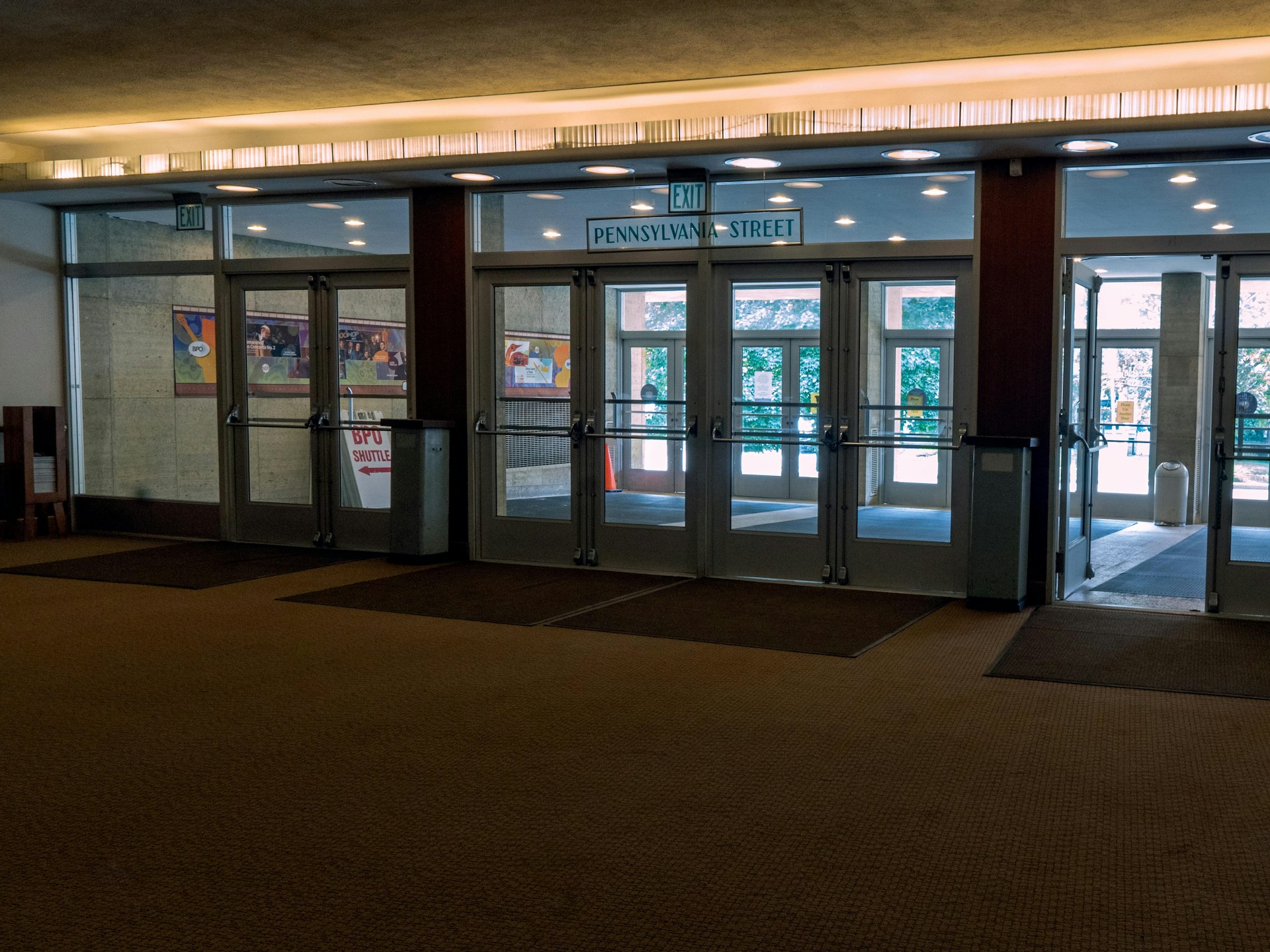 a large room with a lot of glass doors