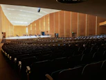 a large auditorium with rows of empty seats