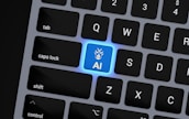 a computer keyboard with a blue light on it