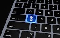 a computer keyboard with a blue light on it