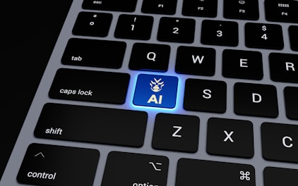 a computer keyboard with a blue light on it