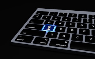a close up of a keyboard on a black surface