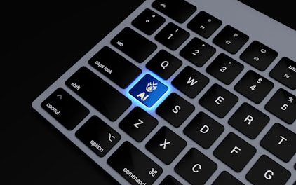 a close up of a keyboard with a blue key