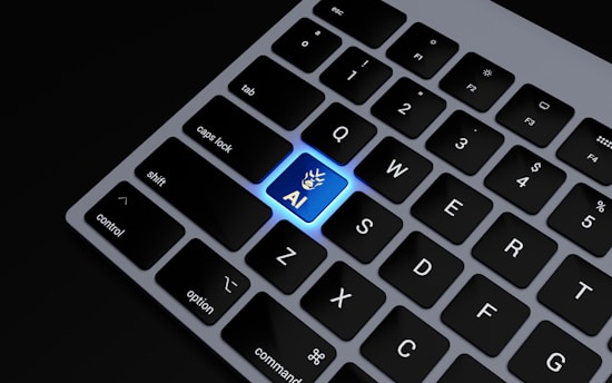 a close up of a keyboard with a blue key
