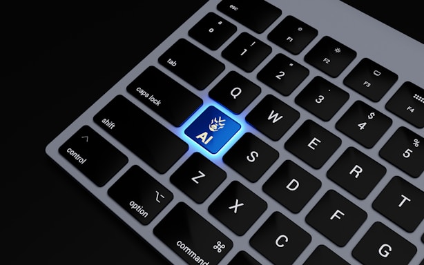 a close up of a keyboard with a blue key