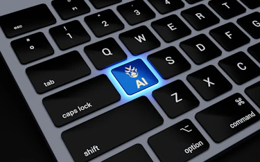 a computer keyboard with a blue light on it