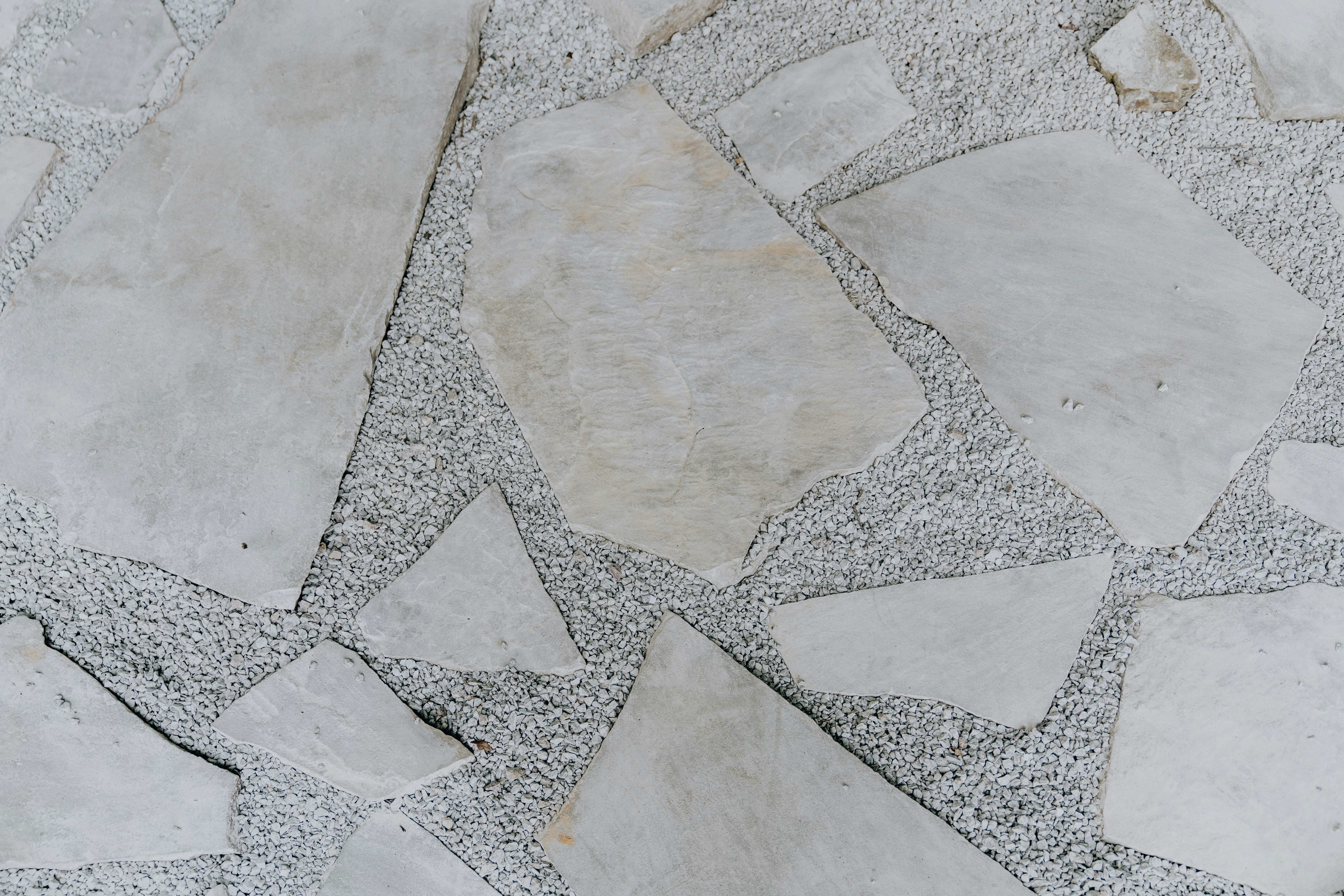 a close up of a white stone floor