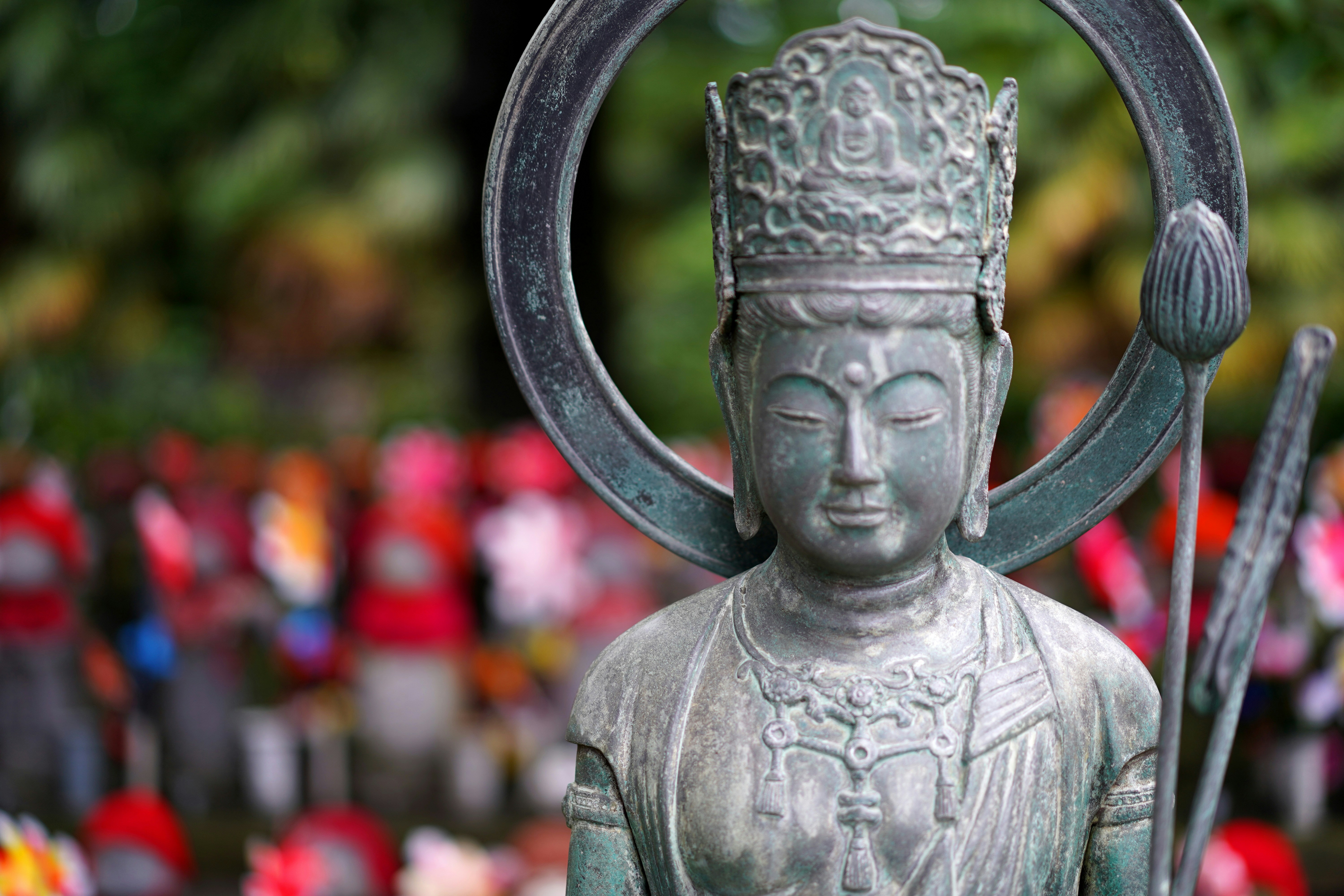 a statue of a person with a ring around their neck