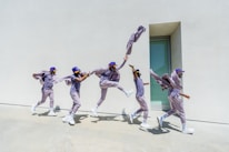 a group of people that are standing in the air