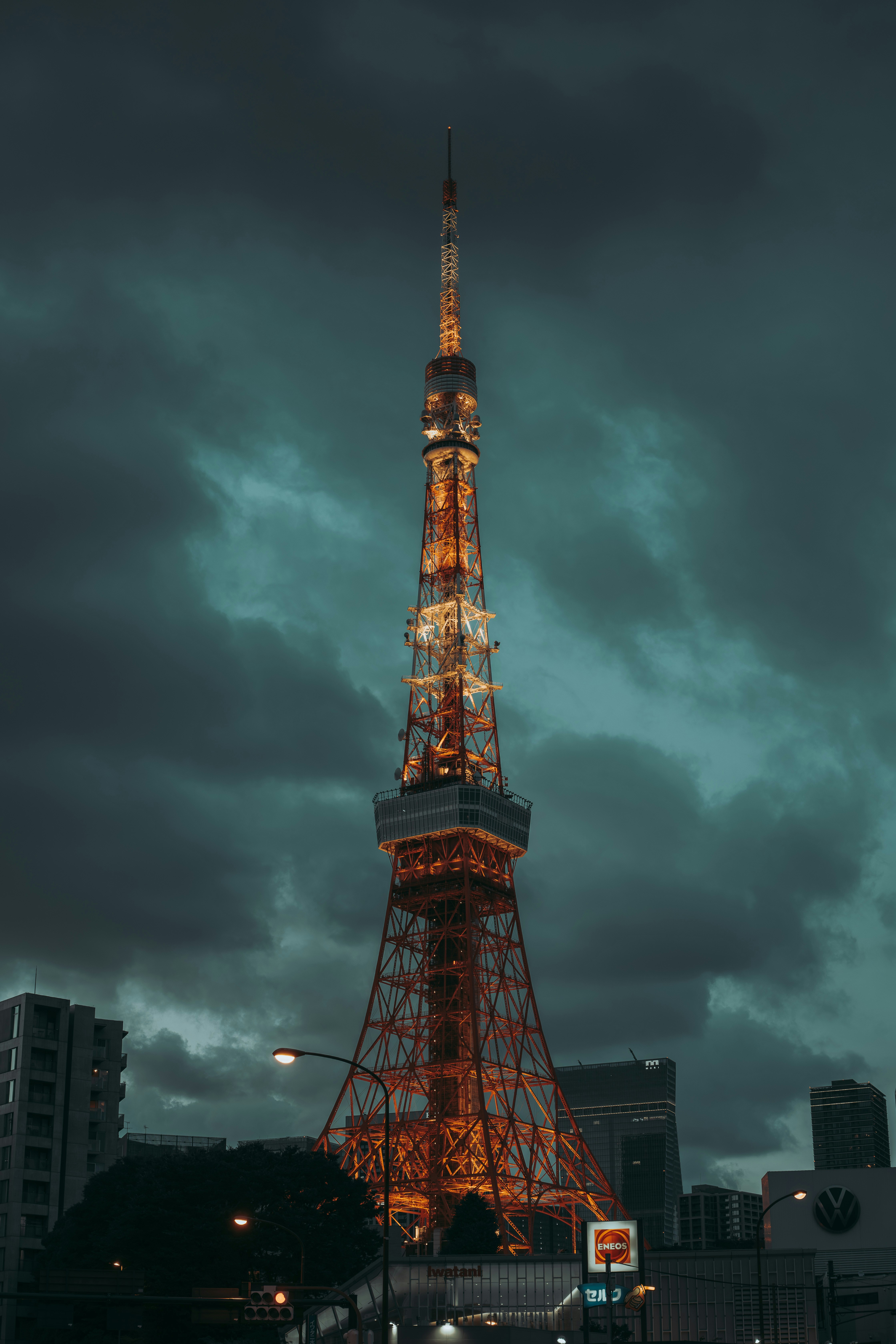 the eiffel tower is lit up at night