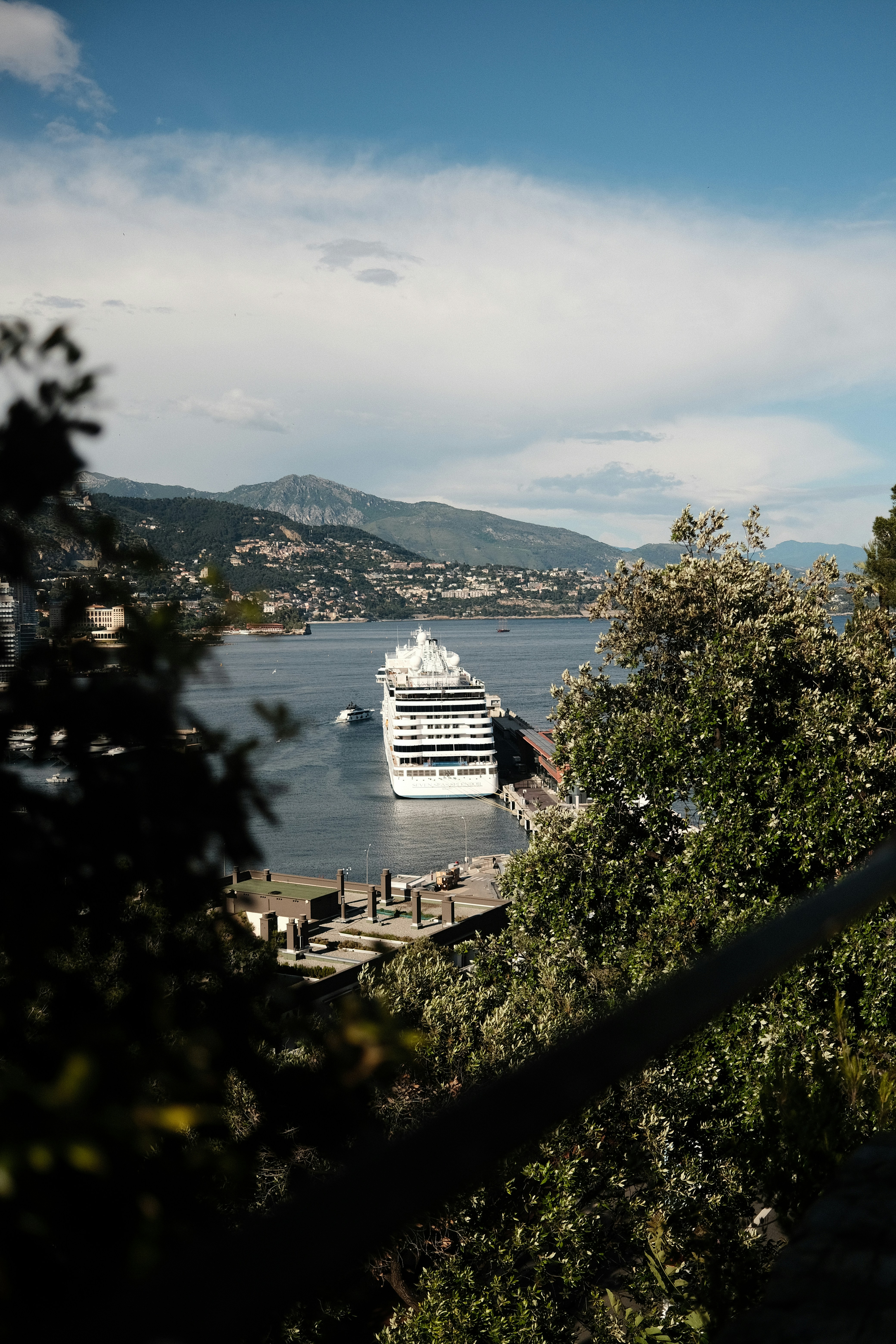a cruise ship is docked at a dock