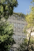 a building that has a decorative design on the side of it
