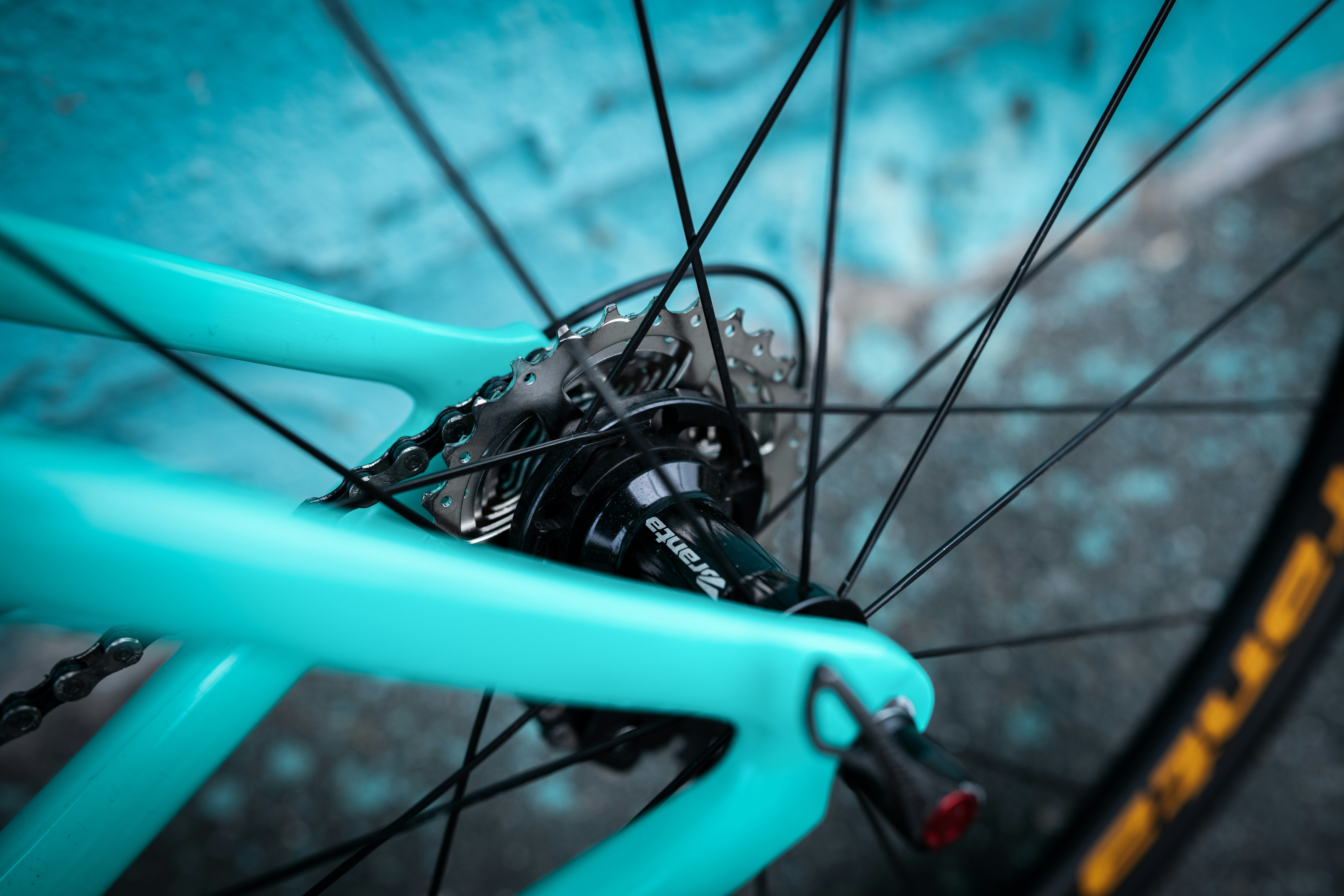 a close up of the spokes on a bicycle