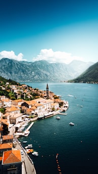 an aerial view of a town on the water
