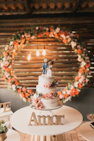a wedding cake sitting on top of a table
