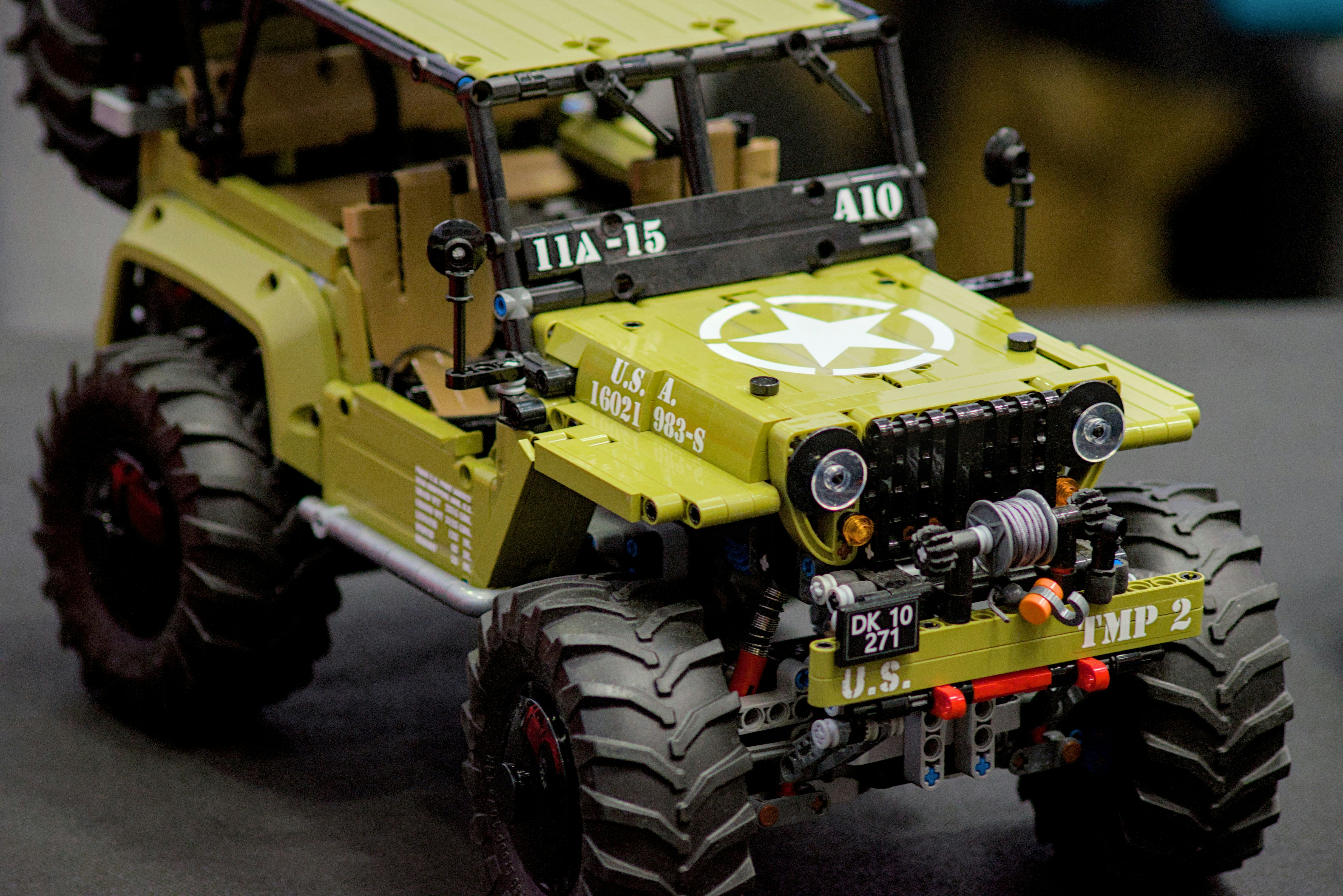 a yellow toy truck with a star on it