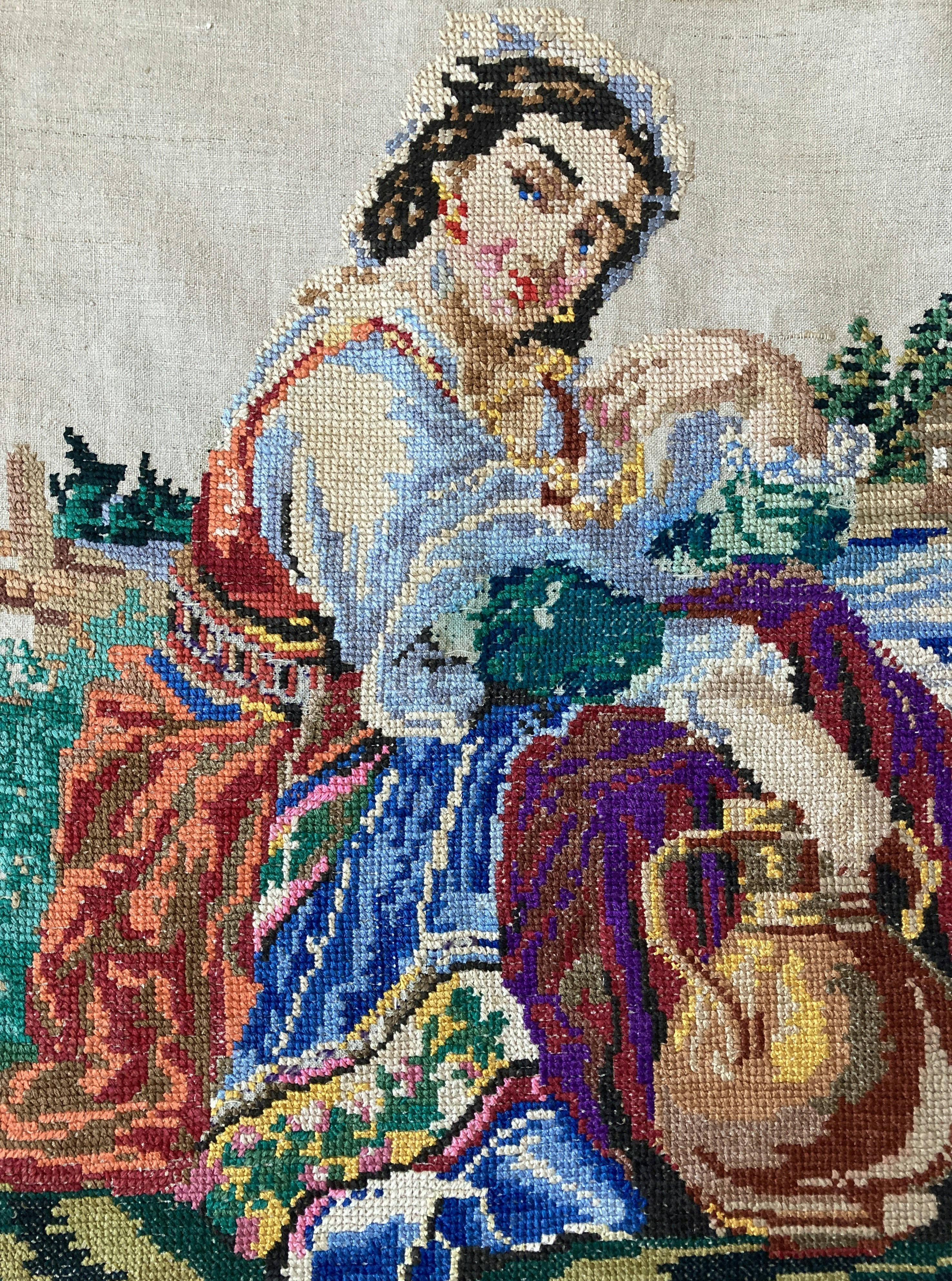 a picture of a woman sitting on a rug