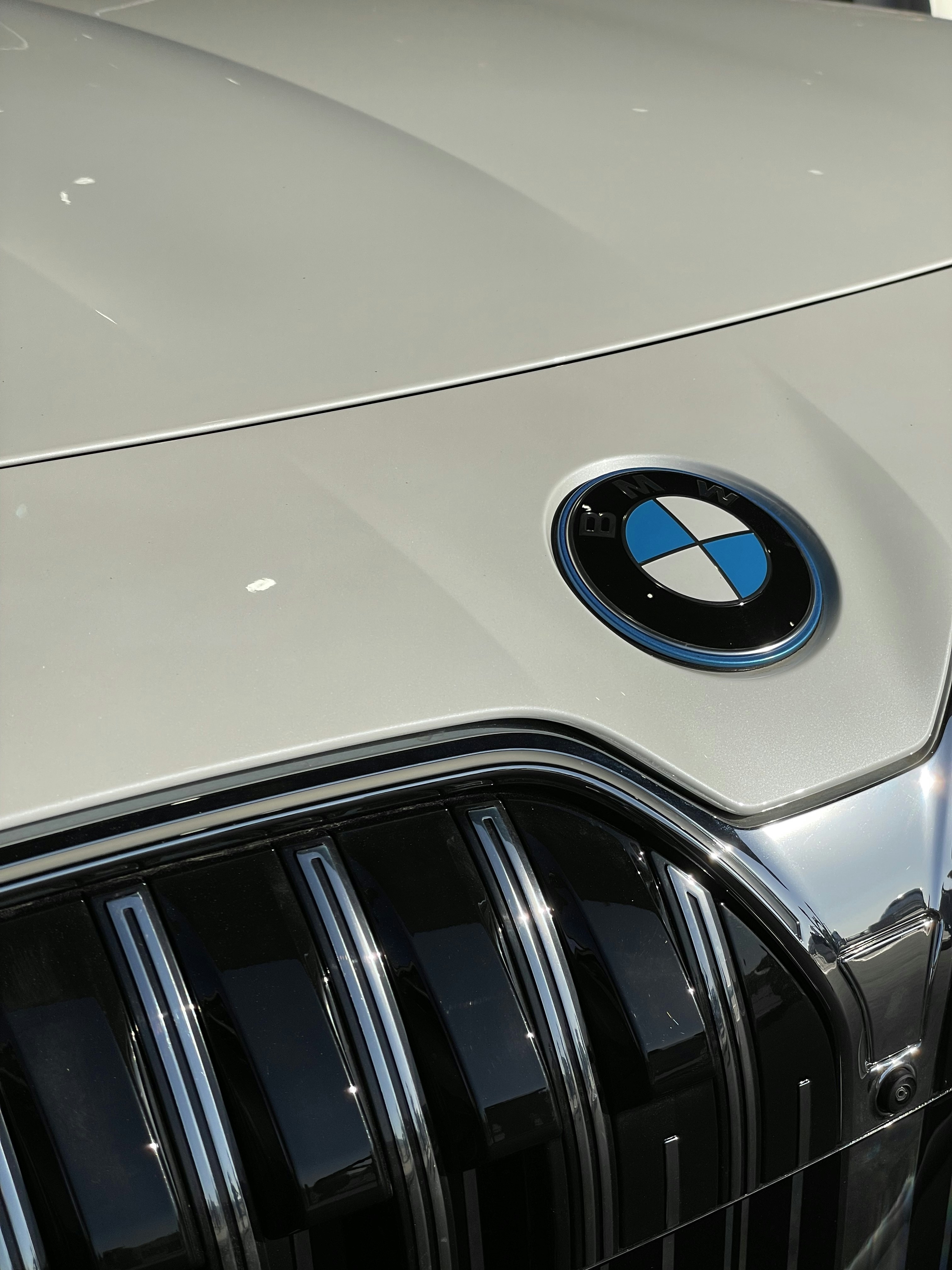 a close up of a bmw logo on a car