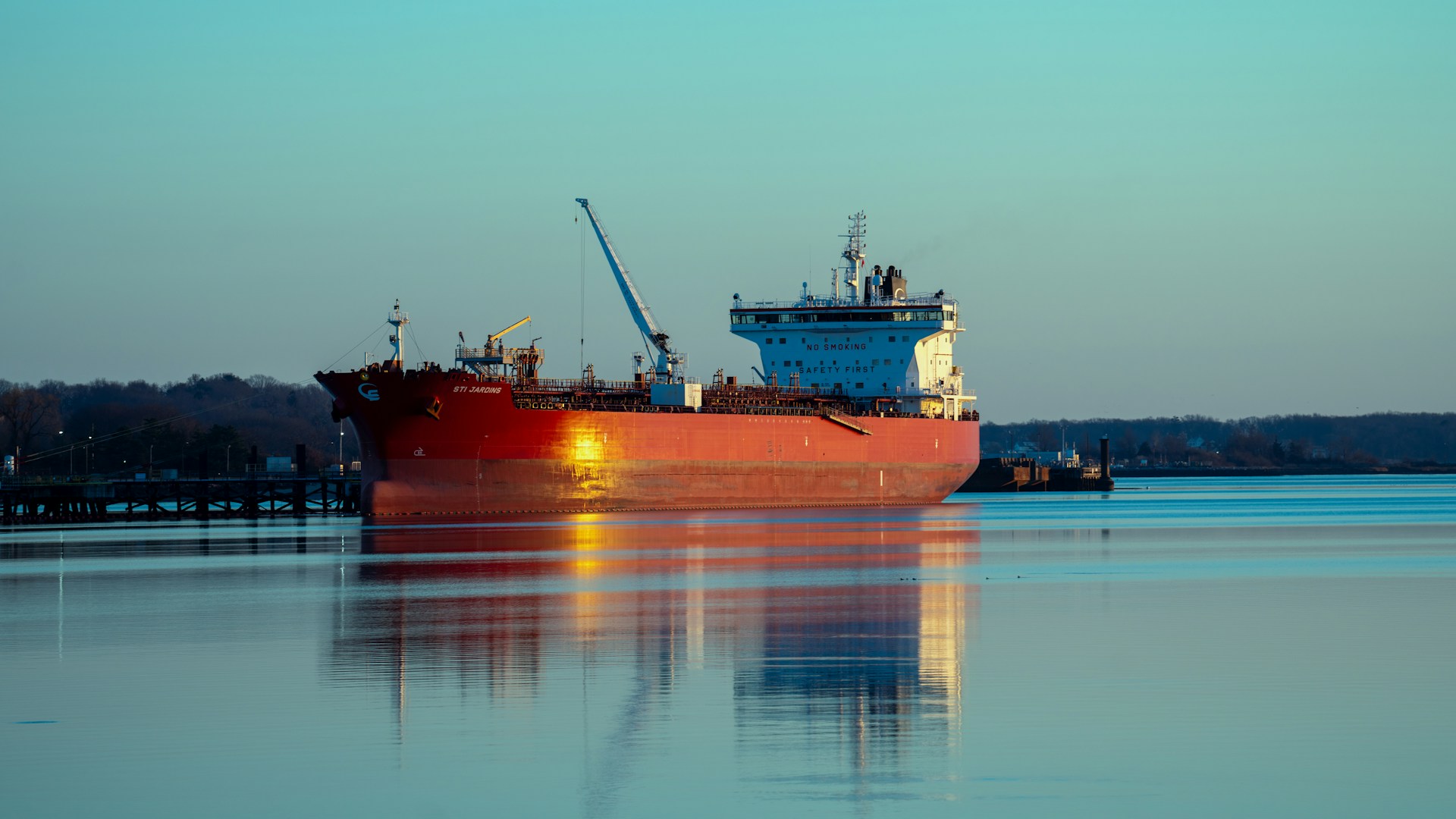 a large cargo ship in the middle of a body of water