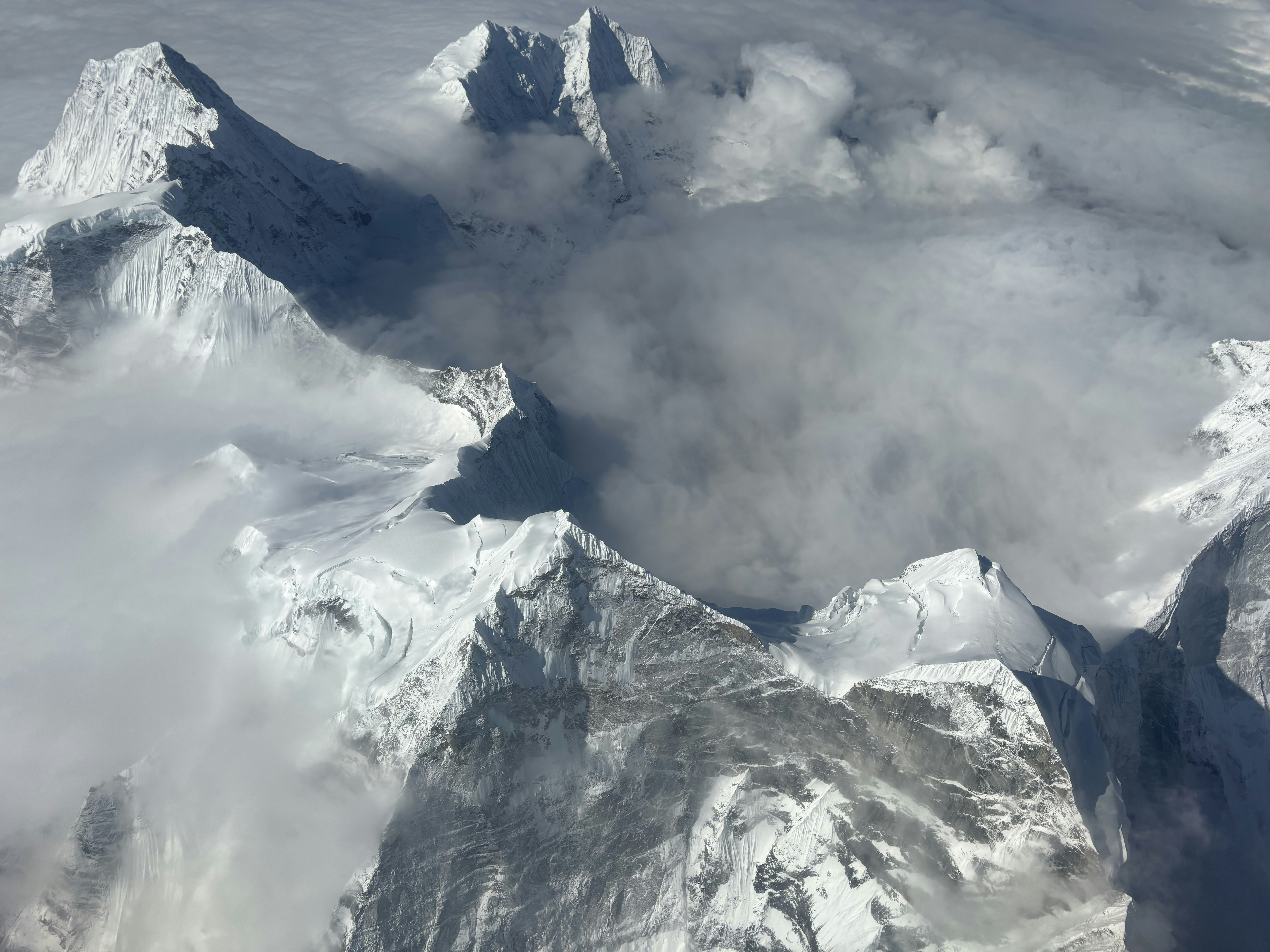 a view of a mountain range from an airplane