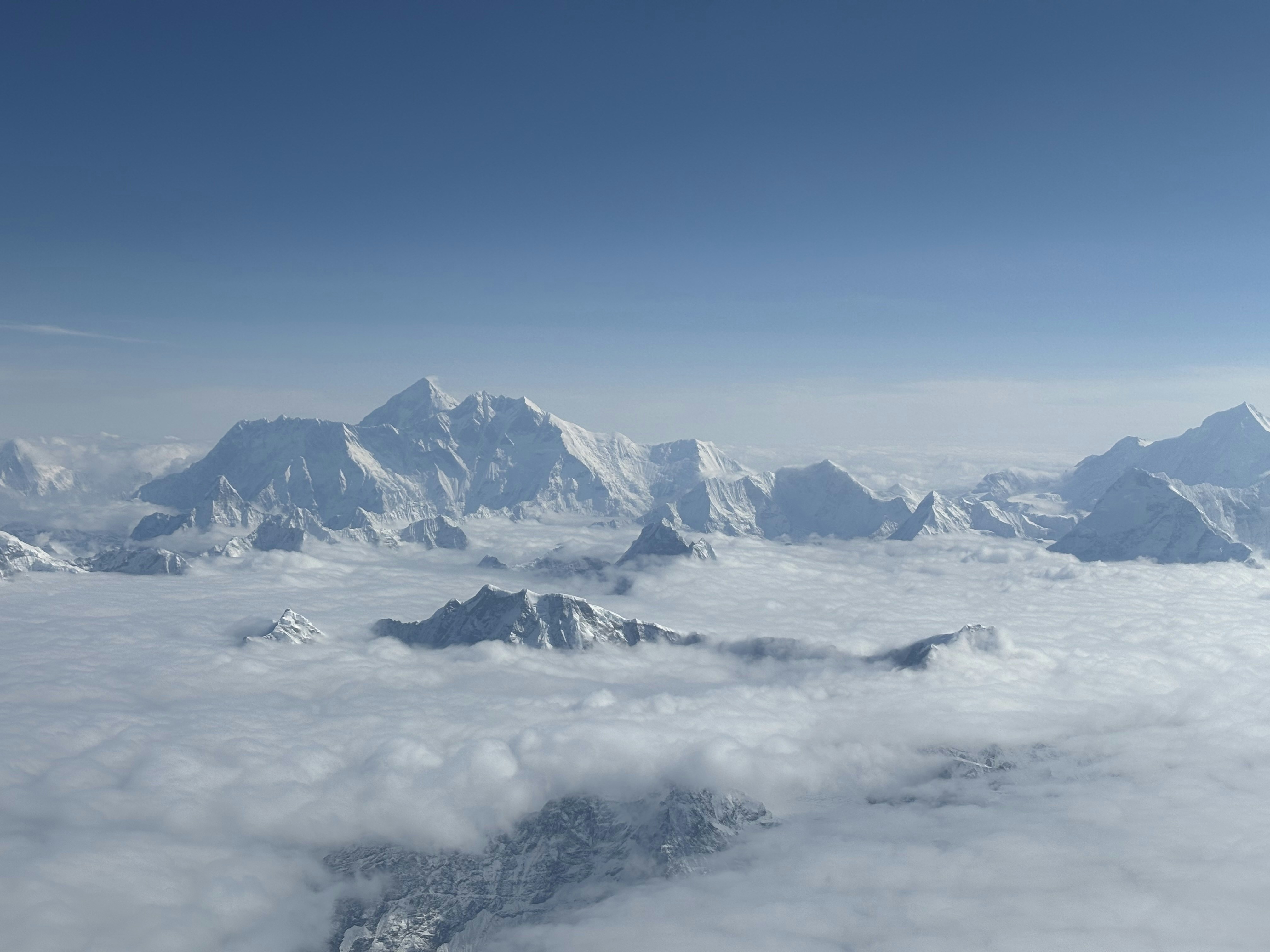a view of a mountain range from an airplane