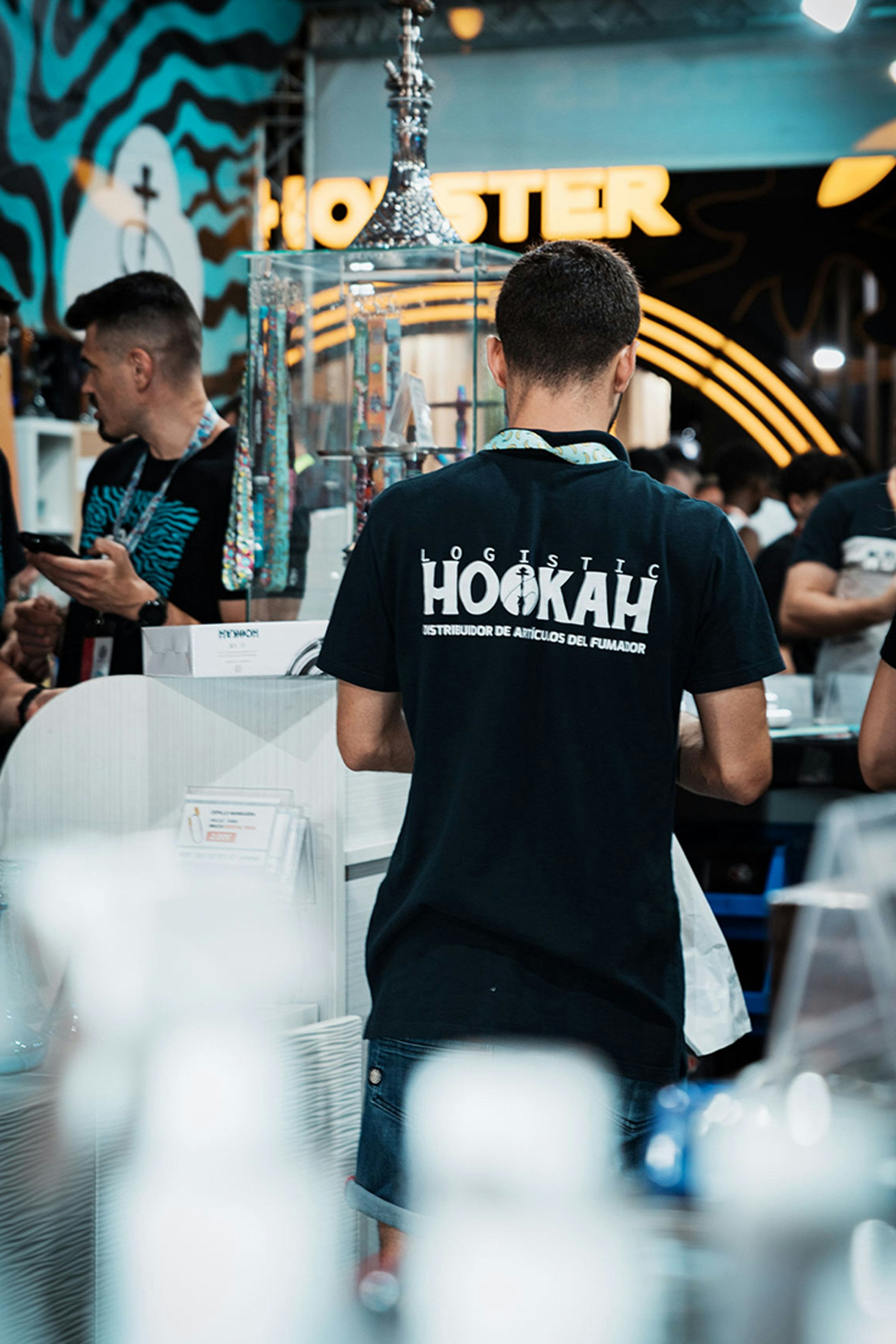 A group of people standing around a store