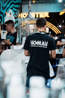 A group of people standing around a store