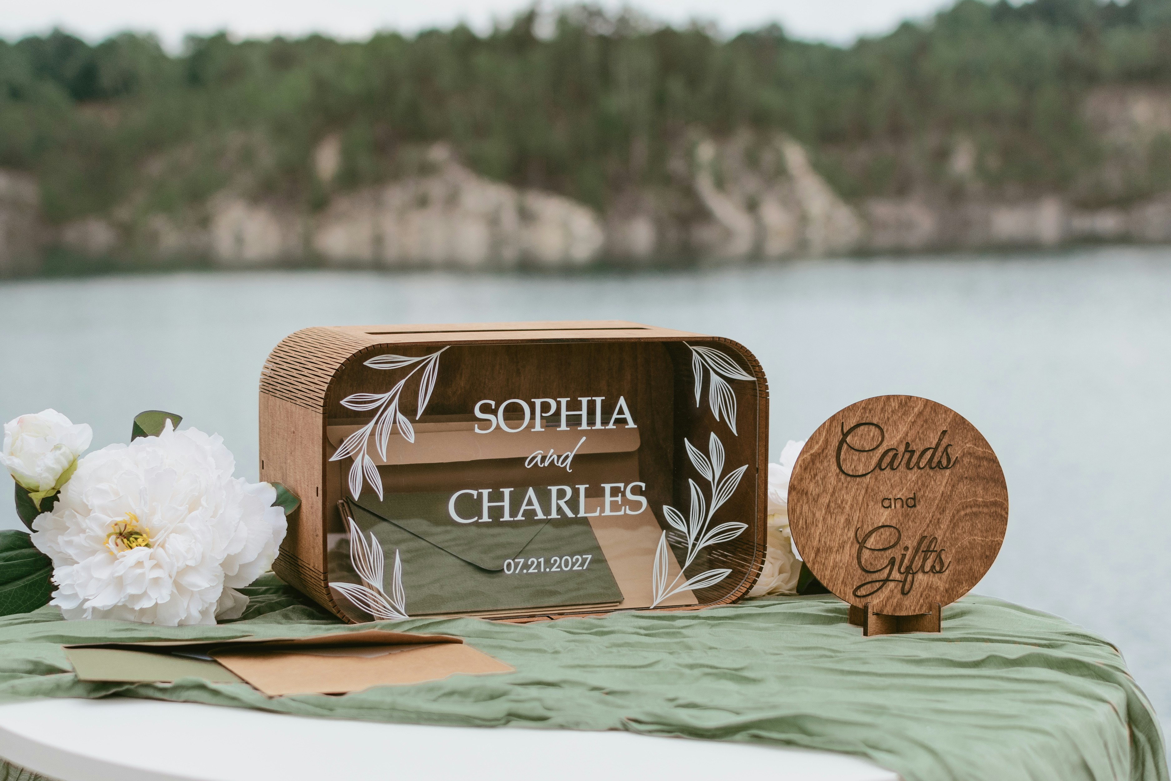 Engraved wooden wedding decor details on a table