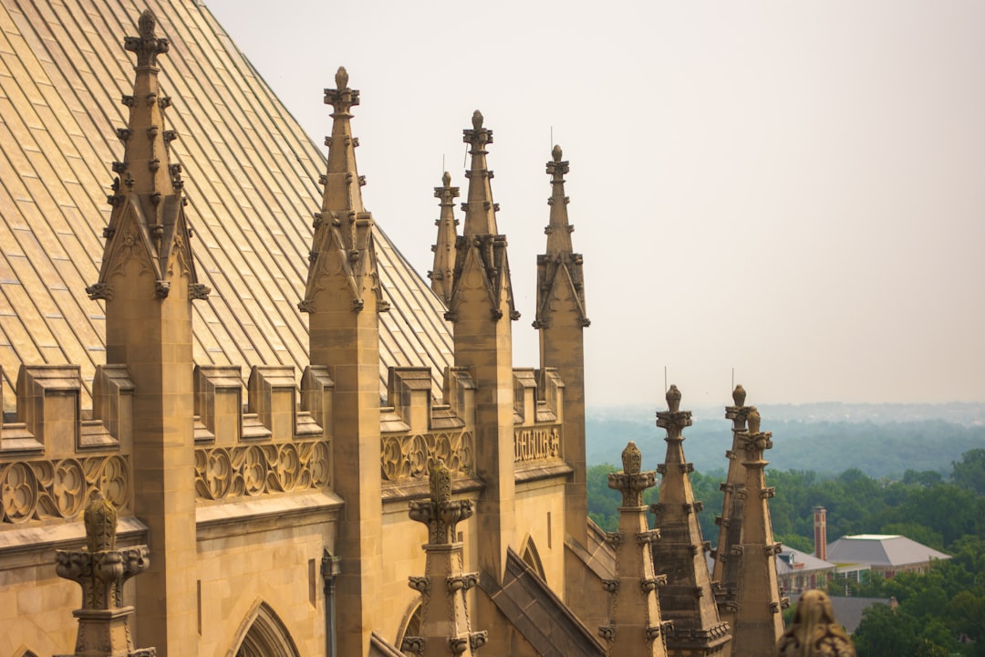 a large building with many spires on top of it, Washington DC, USA. July, 2023 NIKON D3400