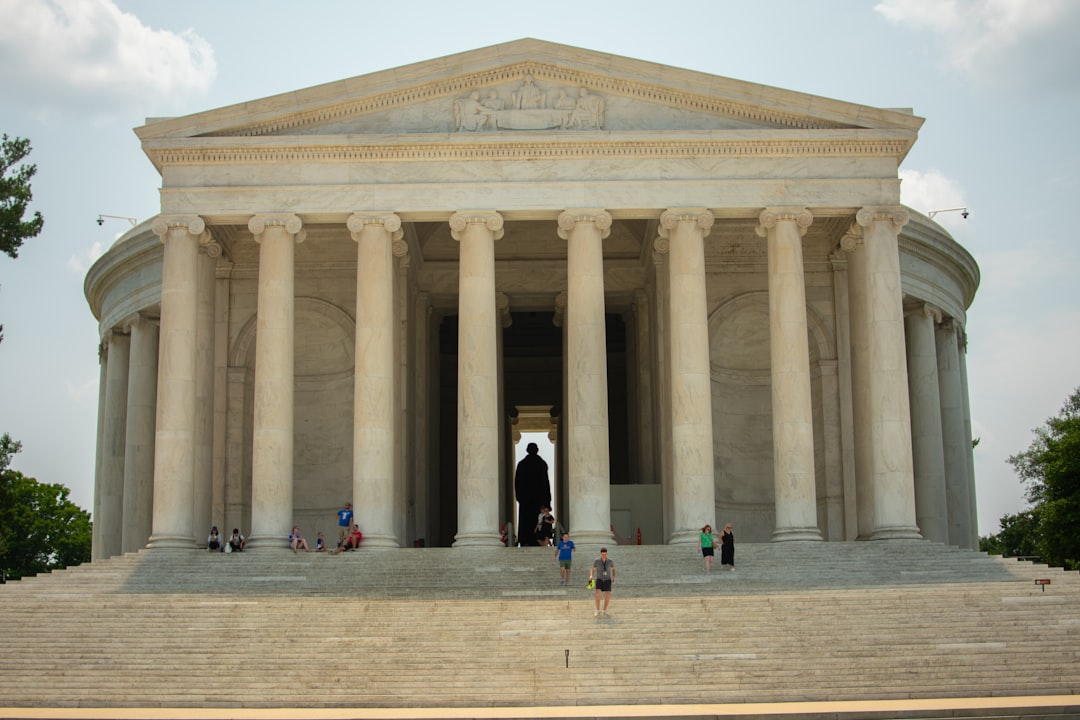 a group of people standing in front of a large building, Washington DC, USA. July, 2023 NIKON D3400