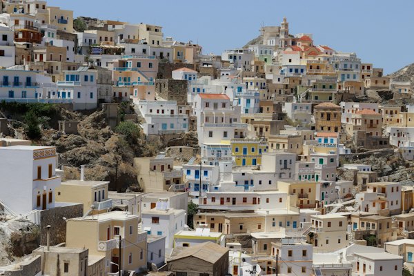 A large group of buildings on top of a hill — Karpathos, Greece