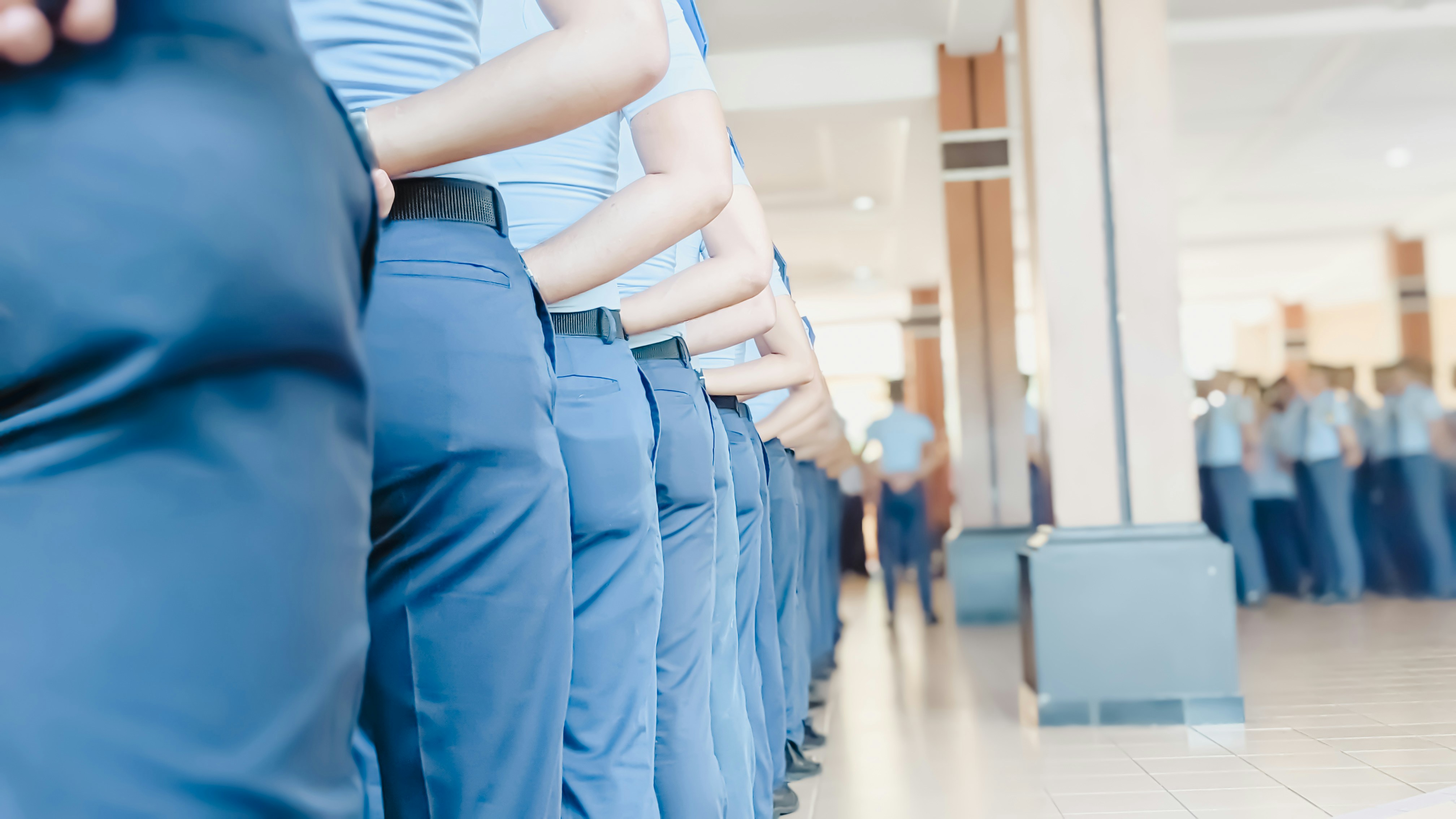 a group of people standing in a line