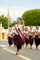 a group of women walking down a street