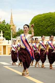 a group of women walking down a street