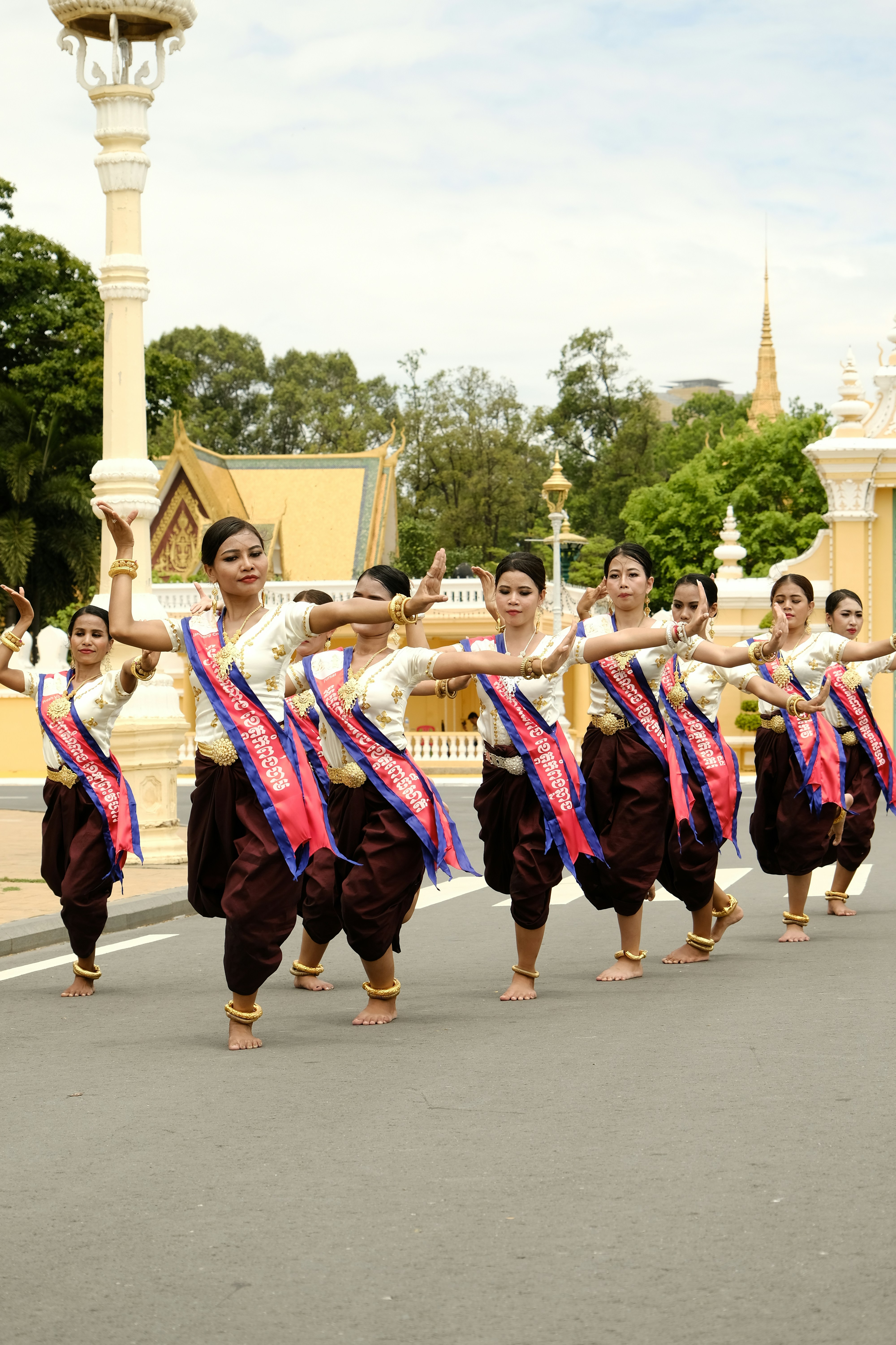 a group of people that are standing in the street