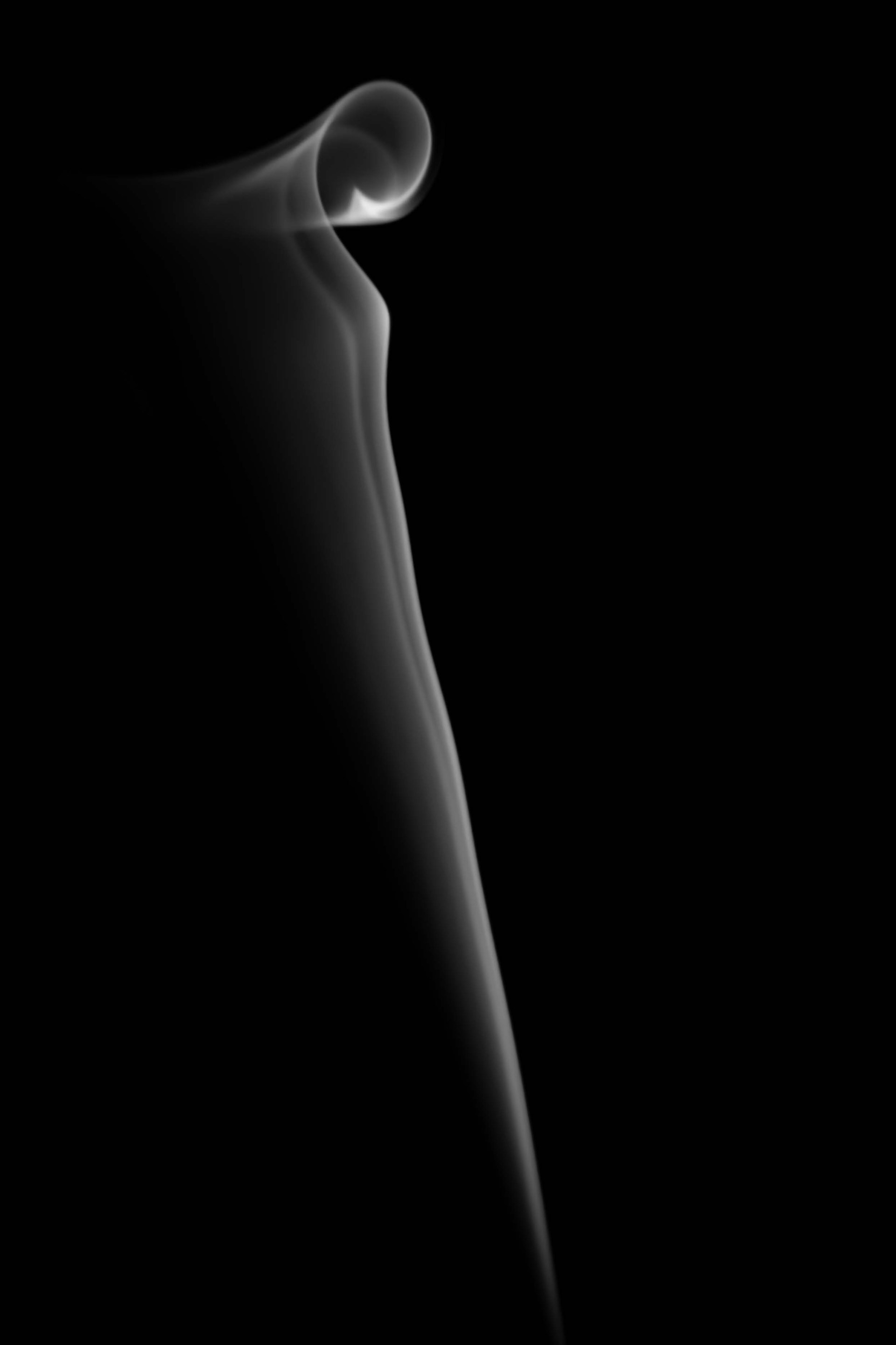 a black background with smoke coming out of it