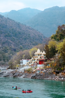 a couple of people in a boat on a river