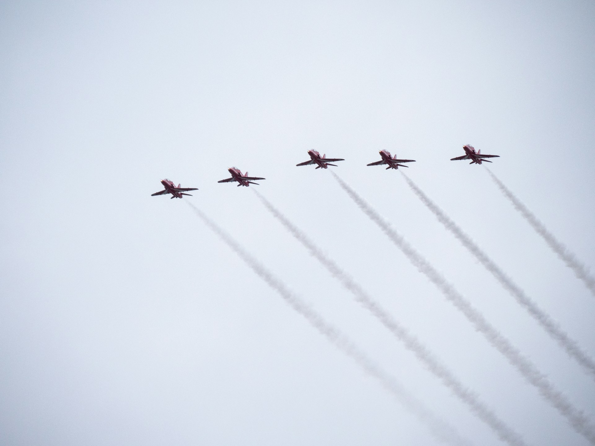 a group of airplanes flying in formation in the sky