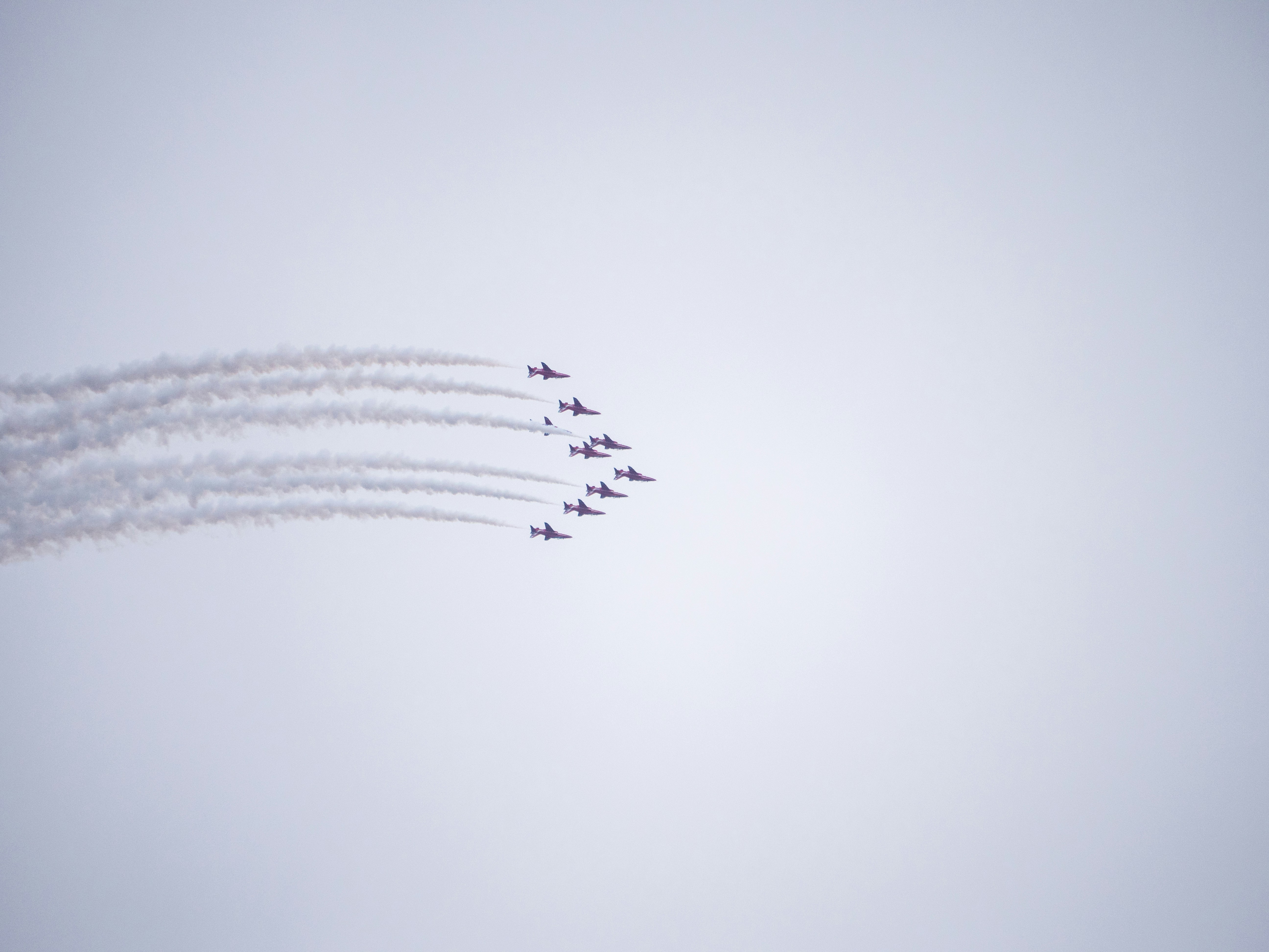 a group of airplanes flying in formation in the sky