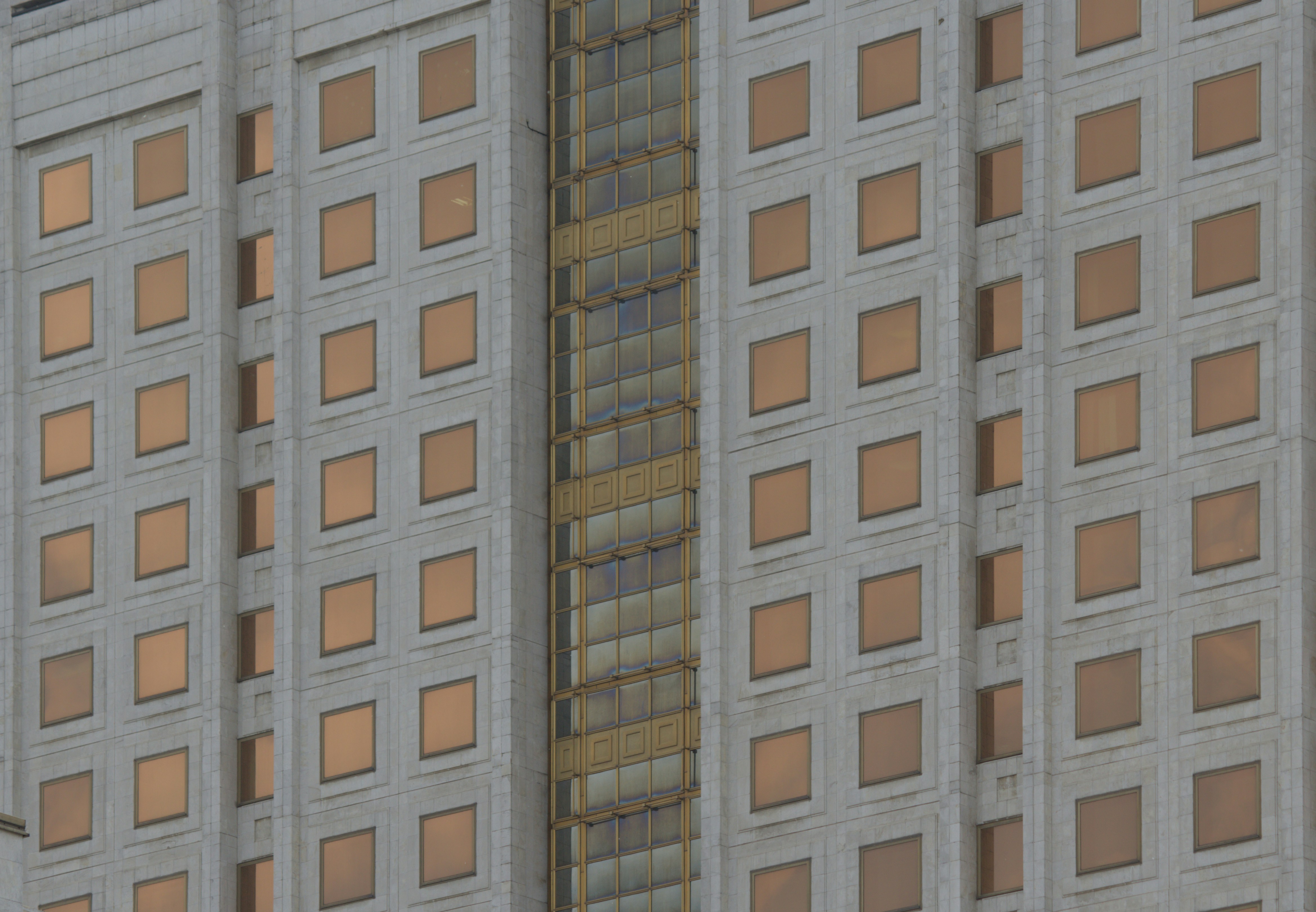 a tall building with a clock on the side of it